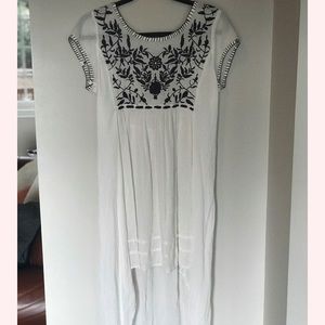 Embroidered high low dress.
